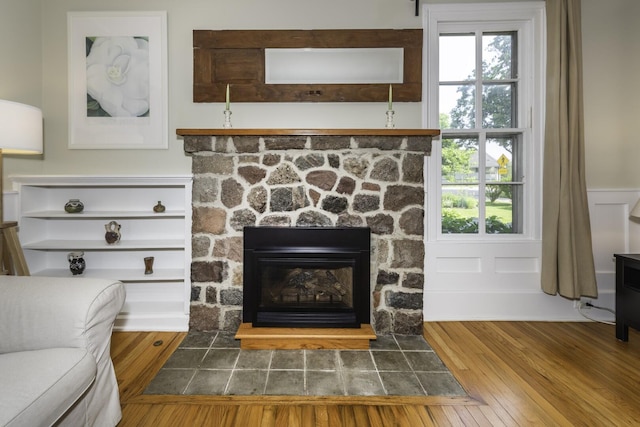 3444 Broad St, Dexter, MI 48130 - detailed view of a fireplace and wood finished floors