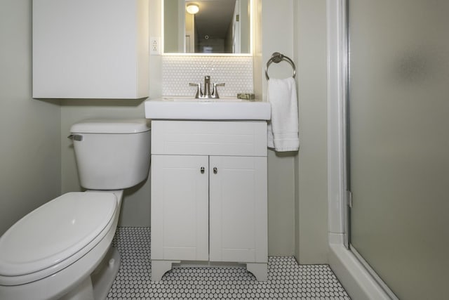 3444 Broad St, Dexter, MI 48130 - bathroom with a shower stall, vanity, tile patterned floors, and tasteful backsplash