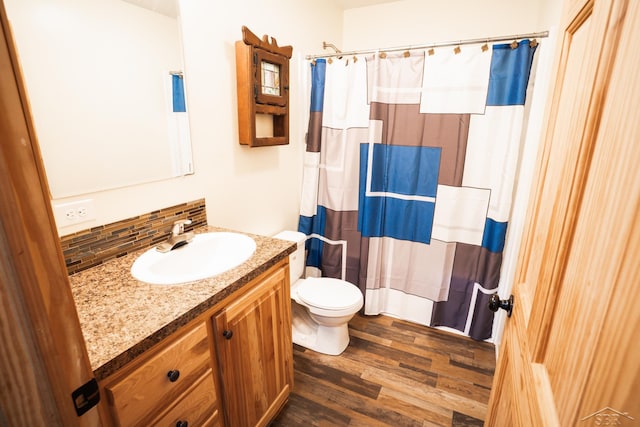 4100 Maloney Rd, Pinconning, MI 48650 - full bath with vanity, decorative backsplash, wood finished floors, and curtained shower