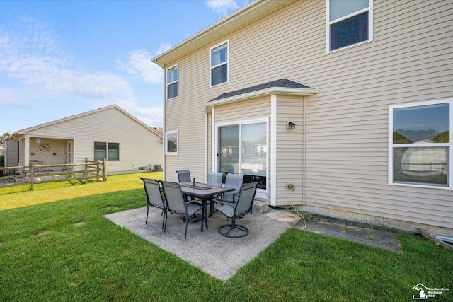 696 Webber Dr, Temperance, MI 48182 - rear view of house with a yard and a patio area