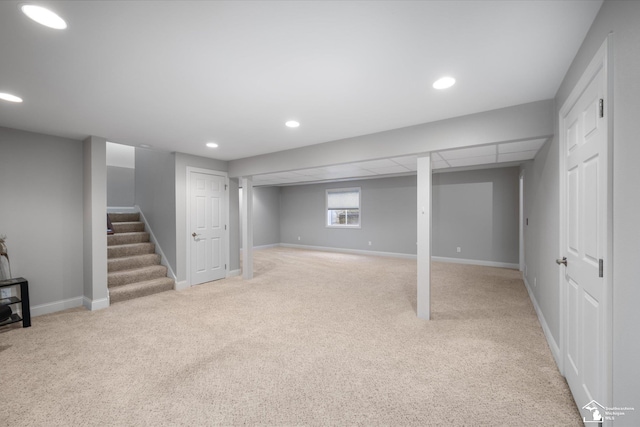696 Webber Dr, Temperance, MI 48182 - basement featuring light carpet, stairway, and recessed lighting