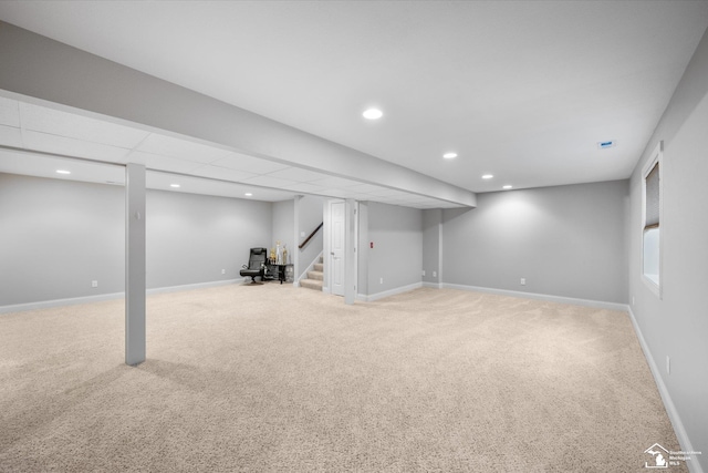 696 Webber Dr, Temperance, MI 48182 - finished below grade area featuring light carpet, stairs, and recessed lighting