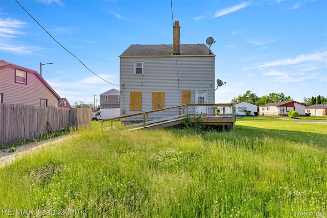 3966 12th St, Ecorse, MI 48229 - back of house with a chimney and a deck