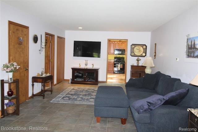 32599 Armada Ridge Rd, Richmond, MI 48062 - living area featuring dark tile patterned floors and recessed lighting