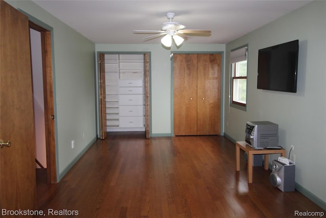 32599 Armada Ridge Rd, Richmond, MI 48062 - unfurnished bedroom featuring wood finished floors and multiple closets