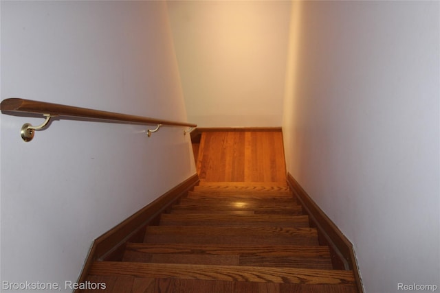 32599 Armada Ridge Rd, Richmond, MI 48062 - staircase with wood finished floors and baseboards