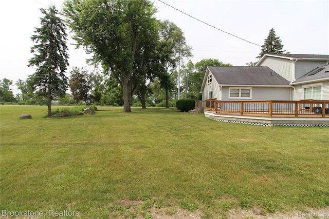 32599 Armada Ridge Rd, Richmond, MI 48062 - view of grassy yard featuring a deck