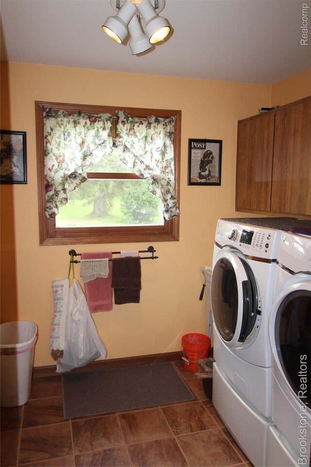 32599 Armada Ridge Rd, Richmond, MI 48062 - laundry room featuring separate washer and dryer and cabinet space