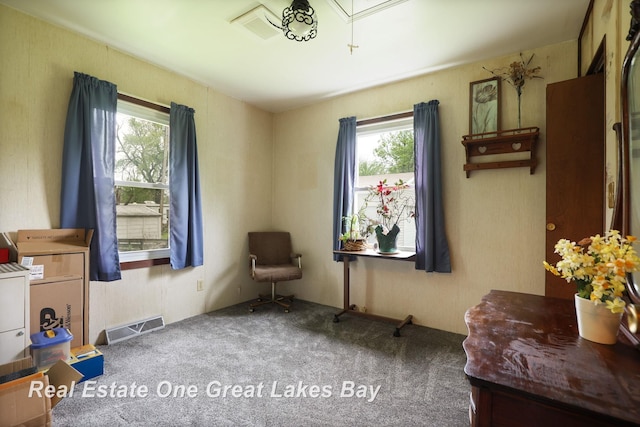 959 N Cass Ave, Vassar, MI 48768 - living area with attic access, plenty of natural light, and carpet flooring