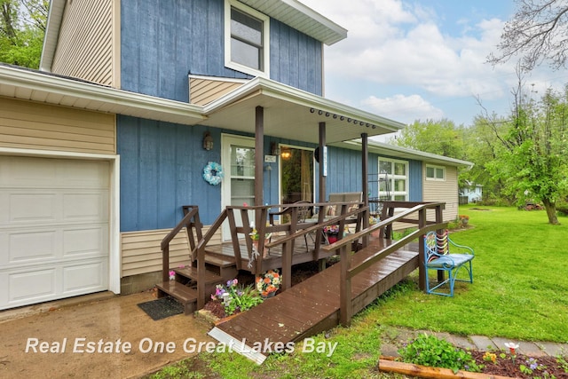 959 N Cass Ave, Vassar, MI 48768 - view of exterior entry with a yard