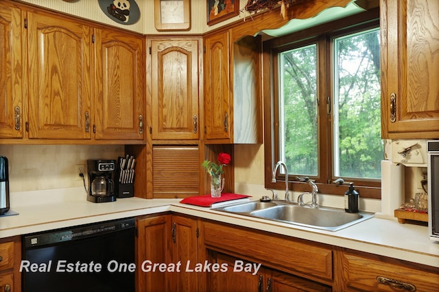 959 N Cass Ave, Vassar, MI 48768 - kitchen with black dishwasher, brown cabinets, plenty of natural light, and light countertops