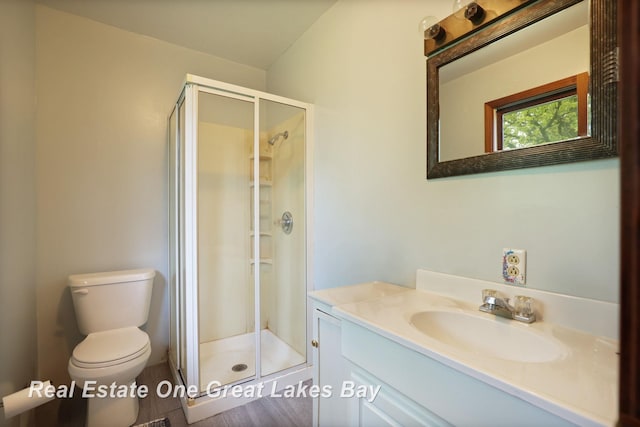 959 N Cass Ave, Vassar, MI 48768 - bathroom featuring vanity and a shower stall