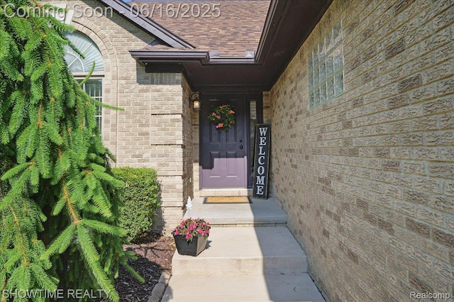 50064 Josephine Dr, Macomb, MI 48044 - doorway to property with roof with shingles and brick siding