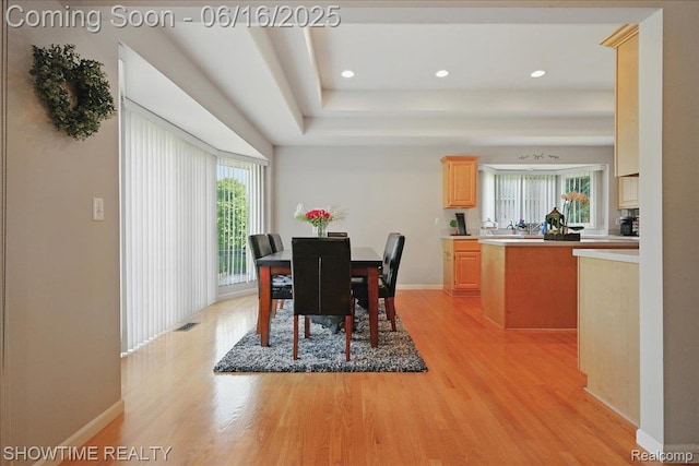 50064 Josephine Dr, Macomb, MI 48044 - dining space with light wood finished floors, healthy amount of natural light, a raised ceiling, and recessed lighting