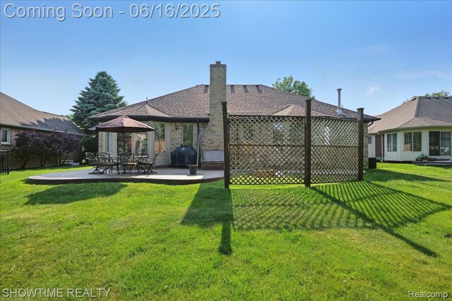 50064 Josephine Dr, Macomb, MI 48044 - rear view of property with a patio area and a chimney