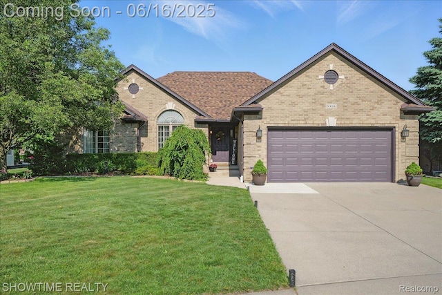 50064 Josephine Dr, Macomb, MI 48044 - view of front of house with driveway, brick siding, a front lawn, and a garage