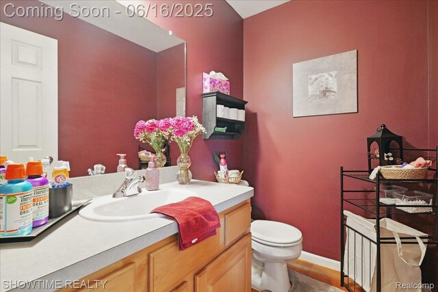 50064 Josephine Dr, Macomb, MI 48044 - bathroom with vanity and wood finished floors