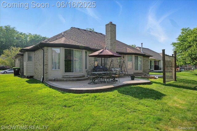 50064 Josephine Dr, Macomb, MI 48044 - rear view of property with a patio, a yard, brick siding, and a chimney