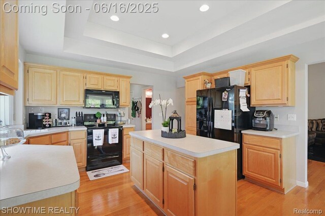 50064 Josephine Dr, Macomb, MI 48044 - kitchen featuring black appliances, light brown cabinetry, light countertops, light wood finished floors, and recessed lighting
