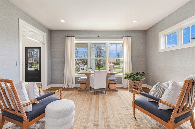 2377 Lake Birch Ct NE, Grand Rapids, MI 49525 - living area with wallpapered walls, healthy amount of natural light, recessed lighting, and wood finished floors