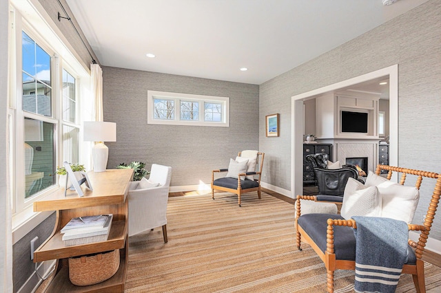 2377 Lake Birch Ct NE, Grand Rapids, MI 49525 - office featuring wallpapered walls and a glass covered fireplace