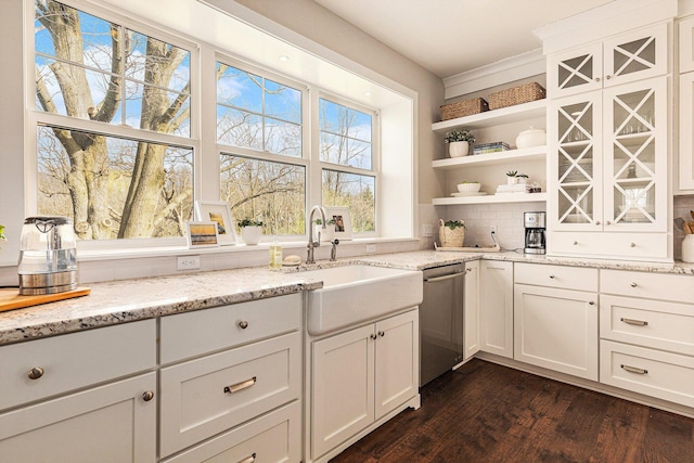 2377 Lake Birch Ct NE, Grand Rapids, MI 49525 - kitchen with dishwasher, open shelves, light stone countertops, and white cabinetry