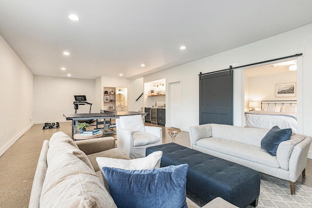 2377 Lake Birch Ct NE, Grand Rapids, MI 49525 - living area with a barn door and recessed lighting