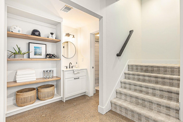 2377 Lake Birch Ct NE, Grand Rapids, MI 49525 - bathroom with vanity and speckled floor