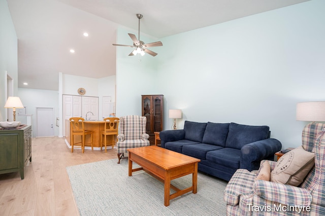 17909 Hidden Dunes Ln Unit B, Spring Lake, MI 49456 - living area with light wood-type flooring, a ceiling fan, high vaulted ceiling, and recessed lighting