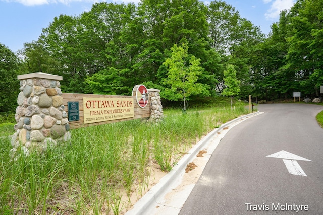 17909 Hidden Dunes Ln Unit B, Spring Lake, MI 49456 - community / neighborhood sign with view of wooded area