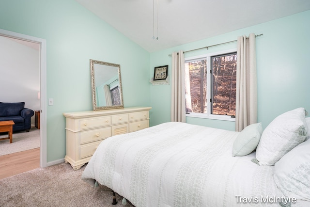17909 Hidden Dunes Ln Unit B, Spring Lake, MI 49456 - bedroom featuring lofted ceiling and light colored carpet