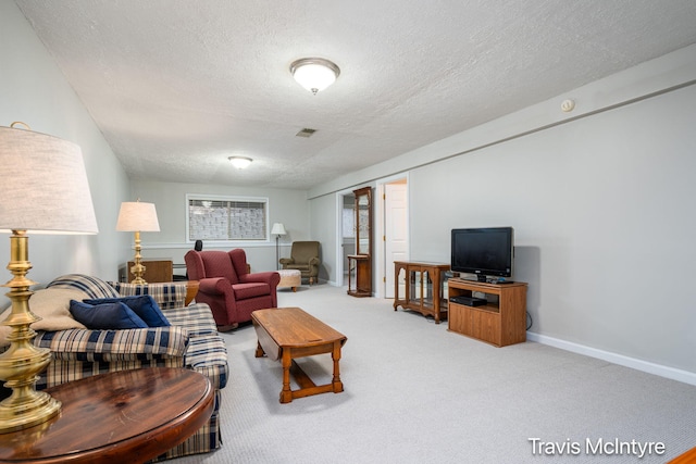 17909 Hidden Dunes Ln Unit B, Spring Lake, MI 49456 - carpeted living room featuring a textured ceiling and baseboards