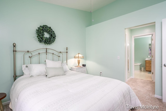 17909 Hidden Dunes Ln Unit B, Spring Lake, MI 49456 - carpeted bedroom with ensuite bath and baseboards