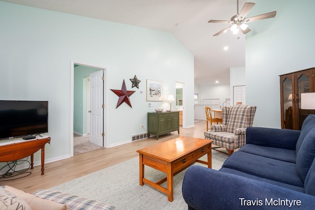 17909 Hidden Dunes Ln Unit B, Spring Lake, MI 49456 - living area featuring light wood finished floors, high vaulted ceiling, and a ceiling fan