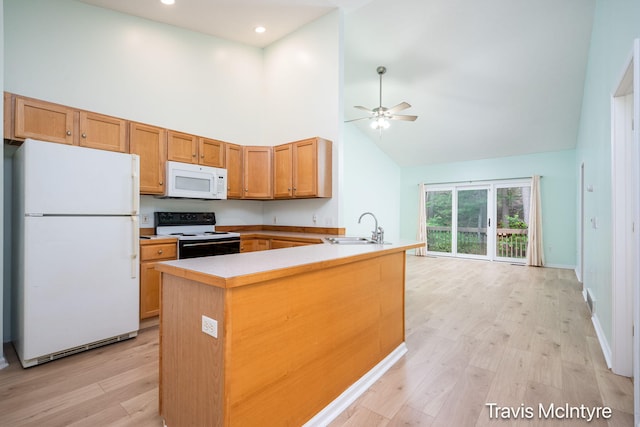 17909 Hidden Dunes Ln Unit B, Spring Lake, MI 49456 - kitchen featuring white appliances, high vaulted ceiling, a ceiling fan, light wood finished floors, and light countertops