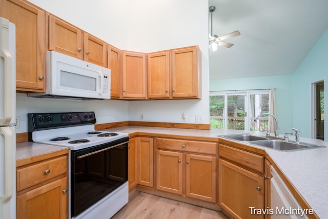17909 Hidden Dunes Ln Unit B, Spring Lake, MI 49456 - kitchen featuring white appliances, light countertops, light wood-style floors, vaulted ceiling, and a ceiling fan