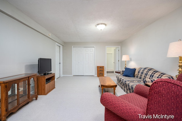 17909 Hidden Dunes Ln Unit B, Spring Lake, MI 49456 - living area featuring light colored carpet and a textured ceiling