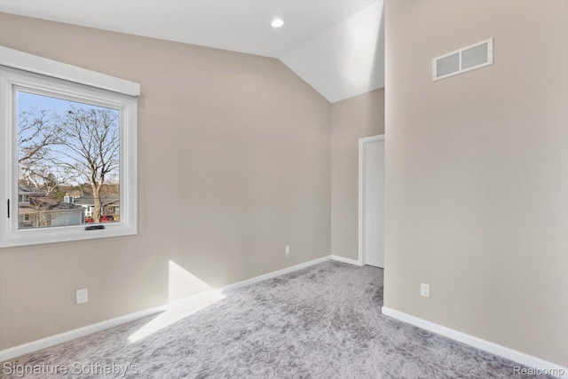 3806 Island Park Dr, Waterford, MI 48329 - carpeted empty room featuring lofted ceiling and baseboards