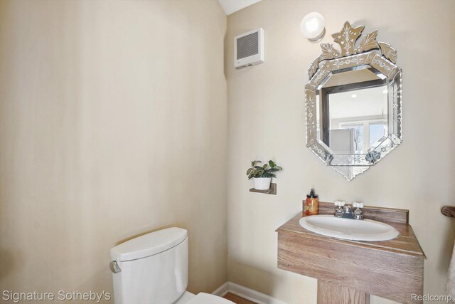 3806 Island Park Dr, Waterford, MI 48329 - bathroom featuring a sink and toilet