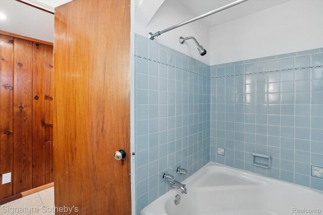 3806 Island Park Dr, Waterford, MI 48329 - bathroom featuring shower / tub combination and tile patterned floors