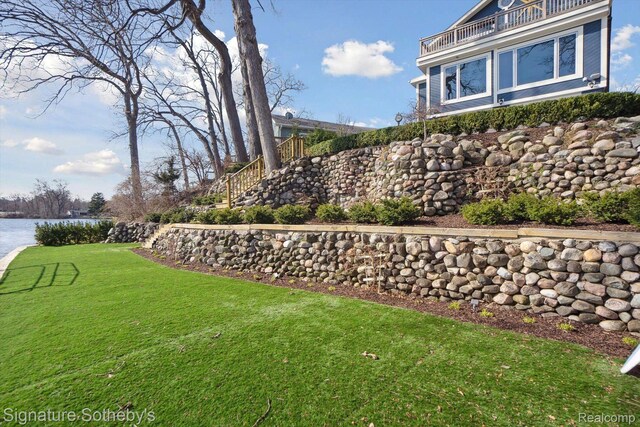 3806 Island Park Dr, Waterford, MI 48329 - view of green lawn featuring a water view and a balcony
