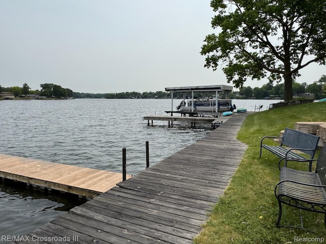 250 N Liberty St Unit 310, Belleville, MI 48111 - dock area featuring a water view, a lawn, and boat lift