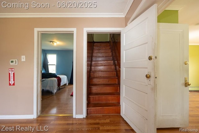 24231 Coolidge Hwy, Oak Park, MI 48237 - staircase with wood finished floors and ornamental molding