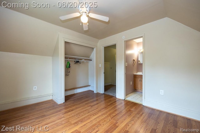 24231 Coolidge Hwy, Oak Park, MI 48237 - unfurnished bedroom featuring vaulted ceiling, a closet, light wood-style floors, connected bathroom, and ceiling fan