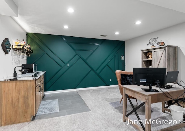 15159 Westray St, Grand Haven, MI 49417 - office area featuring a decorative wall, bar with sink, and recessed lighting