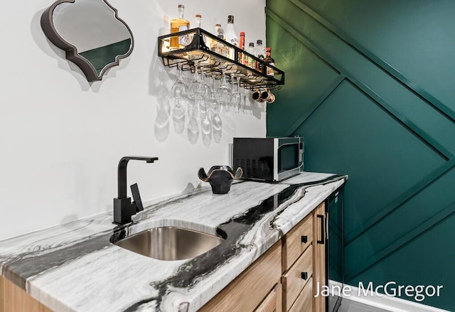 15159 Westray St, Grand Haven, MI 49417 - kitchen with stainless steel microwave and vaulted ceiling