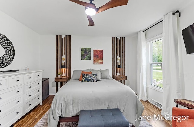 15159 Westray St, Grand Haven, MI 49417 - bedroom featuring dark wood-style floors and ceiling fan