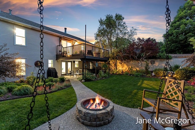 15159 Westray St, Grand Haven, MI 49417 - view of yard with an outdoor fire pit, a patio area, and a deck