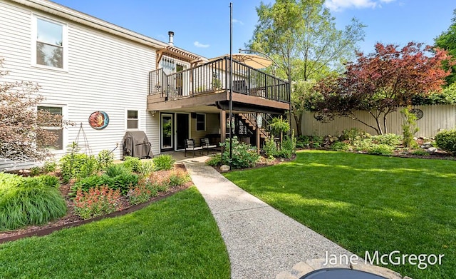 15159 Westray St, Grand Haven, MI 49417 - back of property with a deck, stairway, and a patio area