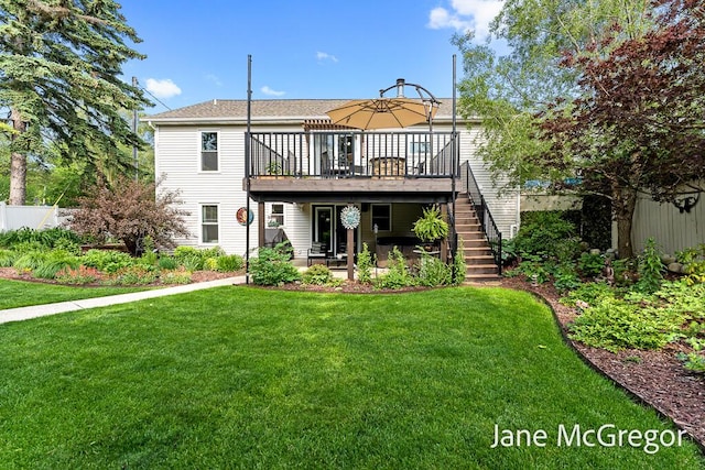 15159 Westray St, Grand Haven, MI 49417 - back of house featuring a wooden deck, stairway, and a patio area